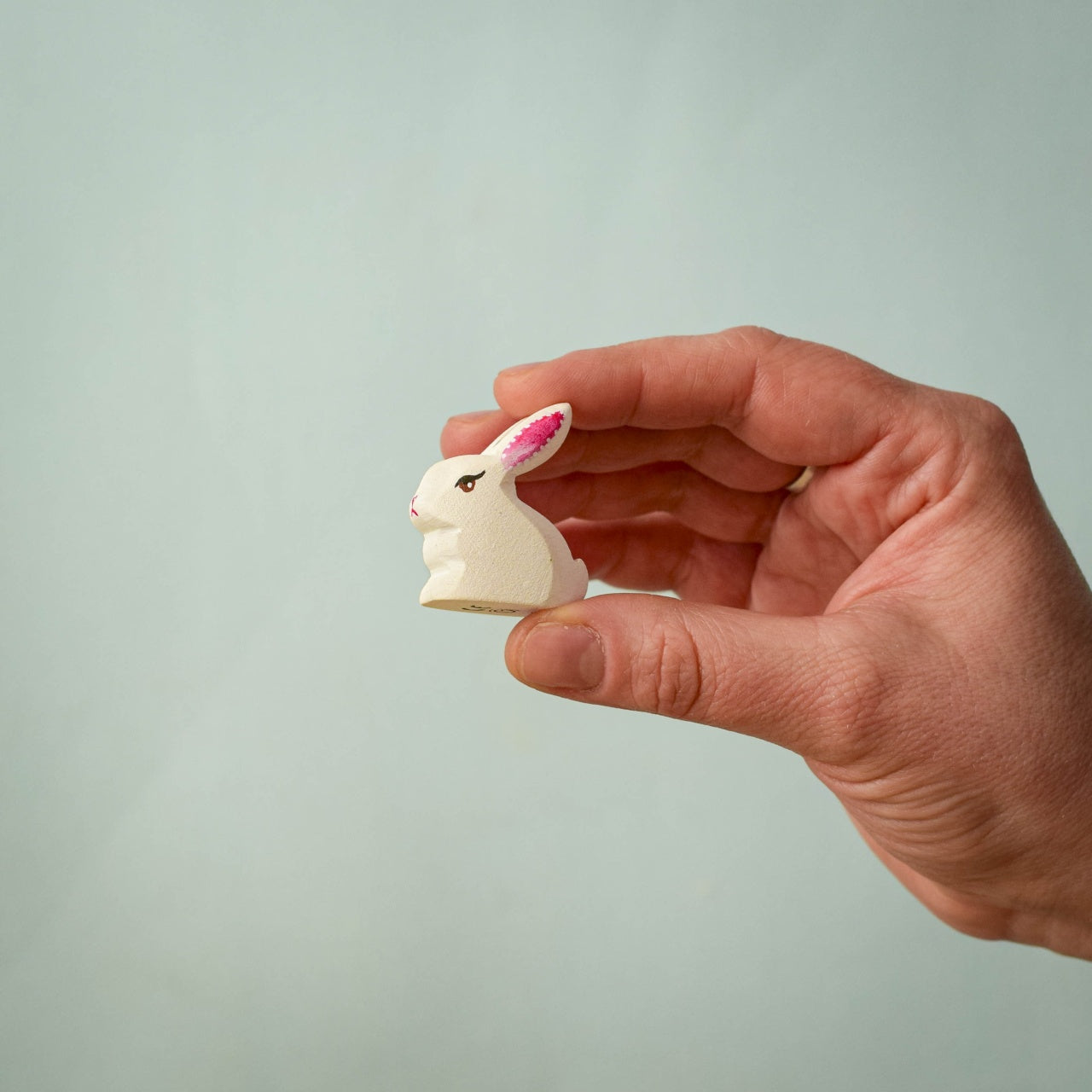 Wooden Sitting White Baby Rabbit
