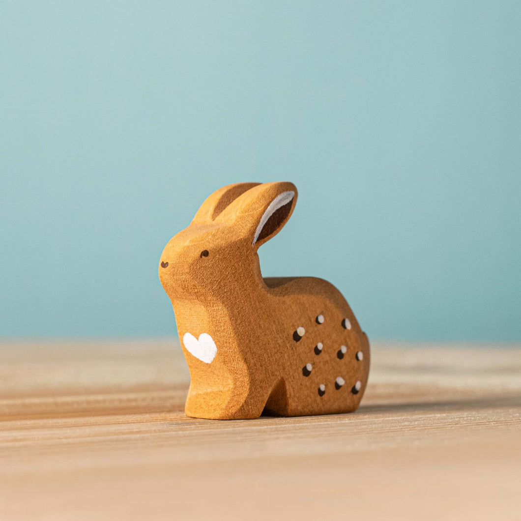 Wooden Sitting Rabbit – A Toy Garden