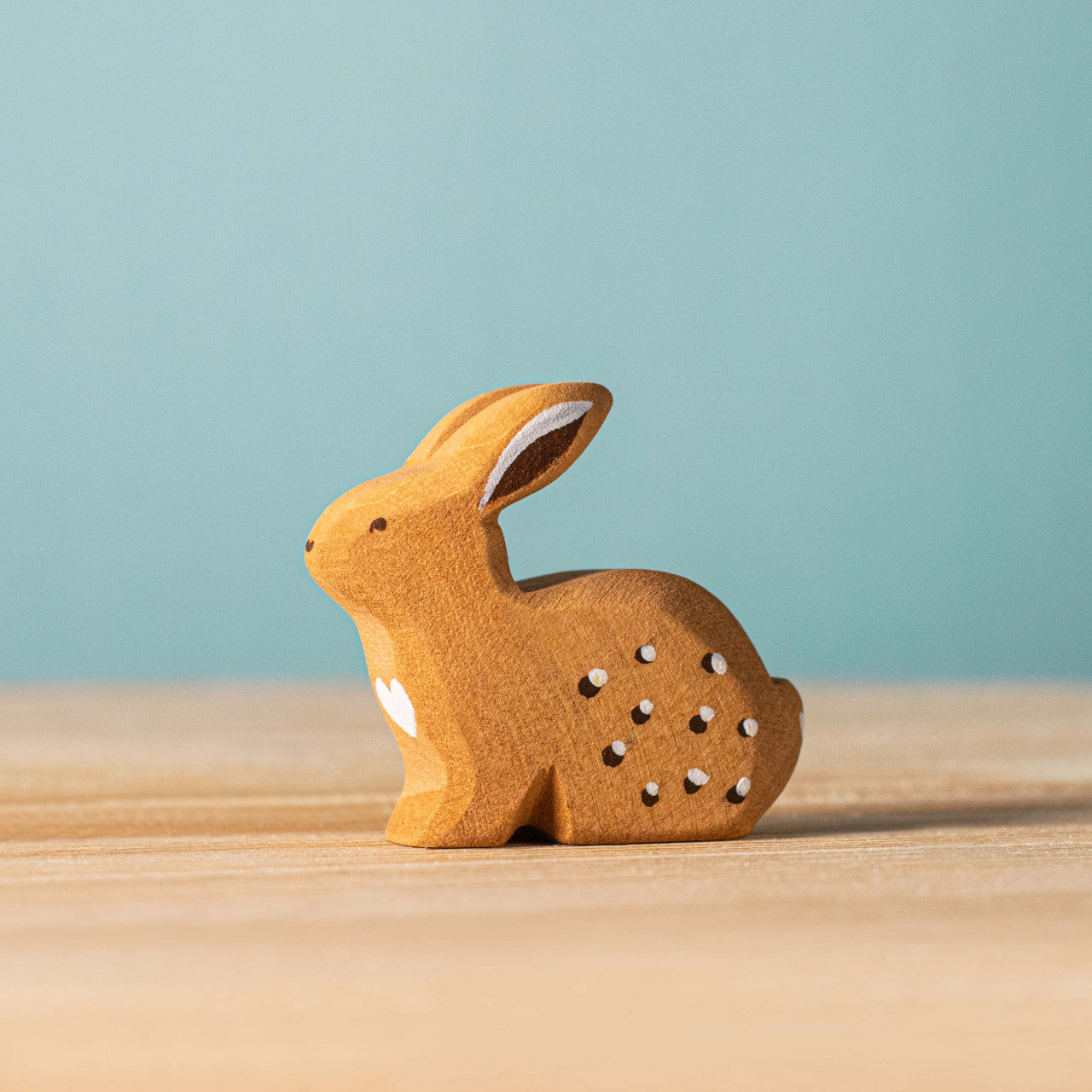 Wooden Sitting Rabbit – A Toy Garden